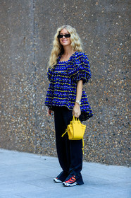 emili sindlev, gucci sunglasses, black sunglasses, knit top, multicolor top, loewe bag, mini bag, hand bag, yellow leather bag, black pants, rolex watch, silvered and golden watch, salomon sneakers, red sneakers, fashion week, frenchystyle, FW, jonathan paciullo, street style, vertical, full length