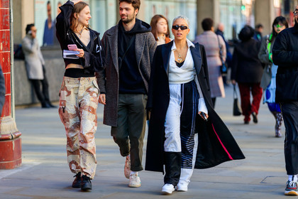 black coat, black jacket, black pants, black shoes, black sneakers, black sweater, brown coat, brown pants, camo pants, camouflage, graphic pants, green pants, hoodie, leather shoes, necklace, printed pants, sunglasses, sweatpants, trousers, white pants, white sneakers, white top, fashion week, frenchystyle, FW, jonathan paciullo, street style, LFW, LONDON, AUTUMN WINTER 2019-2020, AW 19-20, FW 19-20, FALL WINTER 2019-2020, horizontal, atmosphere details, detail