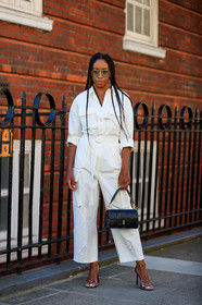 chrissy rutherford, aviator sunglasses, multi necklace, charms necklace, white jumpsuit, wandler bag, black leather bag, hand bag, high heels sandals, sheer strap sandals, fashion week, frenchystyle, FW, jonathan paciullo, street style, vertical, full length