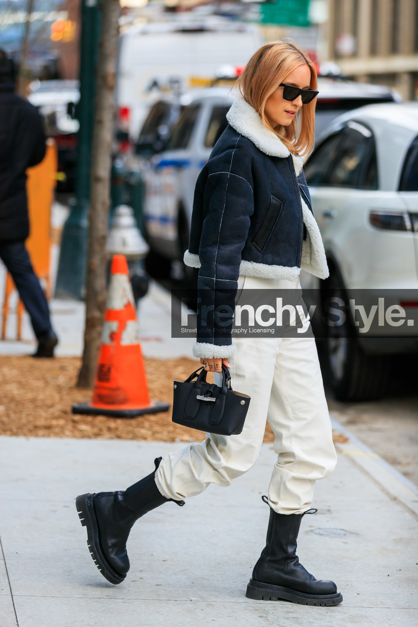 Charlotte Groeneveld, black bombers, black leather boots, black leather bag, suede bombers, chelsea boots, flat boots, big sole boots, mini bag, hand bag, fur coat, fur bombers, celine sunglasses, black sunglasses, futurist shape sunglasses, white leather pants, longchamp bag, fashion week, frenchystyle, FW, jonathan paciullo, street style, FALL WINTER 2020-2021, AUTUMN WINTER 2020-2021, FW 20-21, vertical, full length, NYFW, NEW YORK