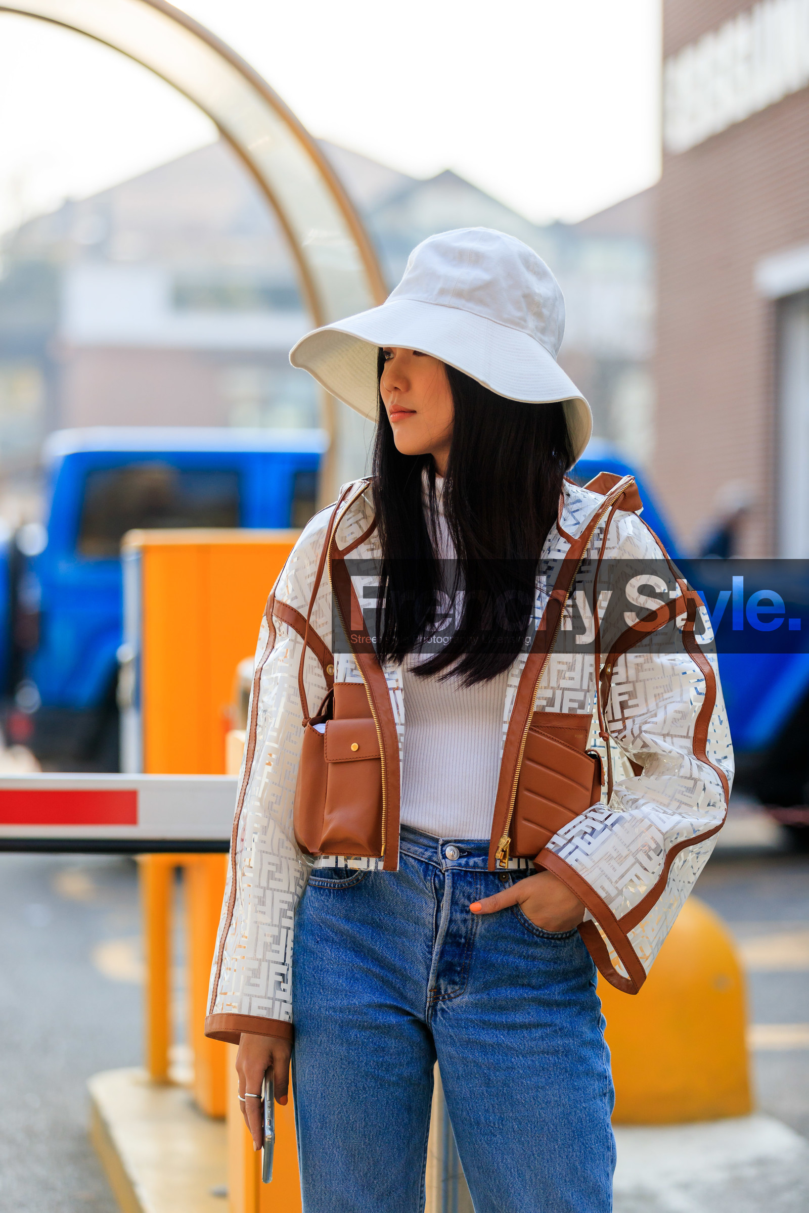 blue denim, denim pants, fendi, graphic jacket, jeans, monogram, printed jacket, transparent jacket, trousers, turtleneck sweater, white hat, white sweater, yoyo cao, MILAN, MFW, fashion week, frenchystyle, FW, jonathan paciullo, street style, AUTUMN WINTER 2019-2020, AW 19-20, FALL WINTER 2019-2020, FW 19-20, vertical, atmosphere details, detail