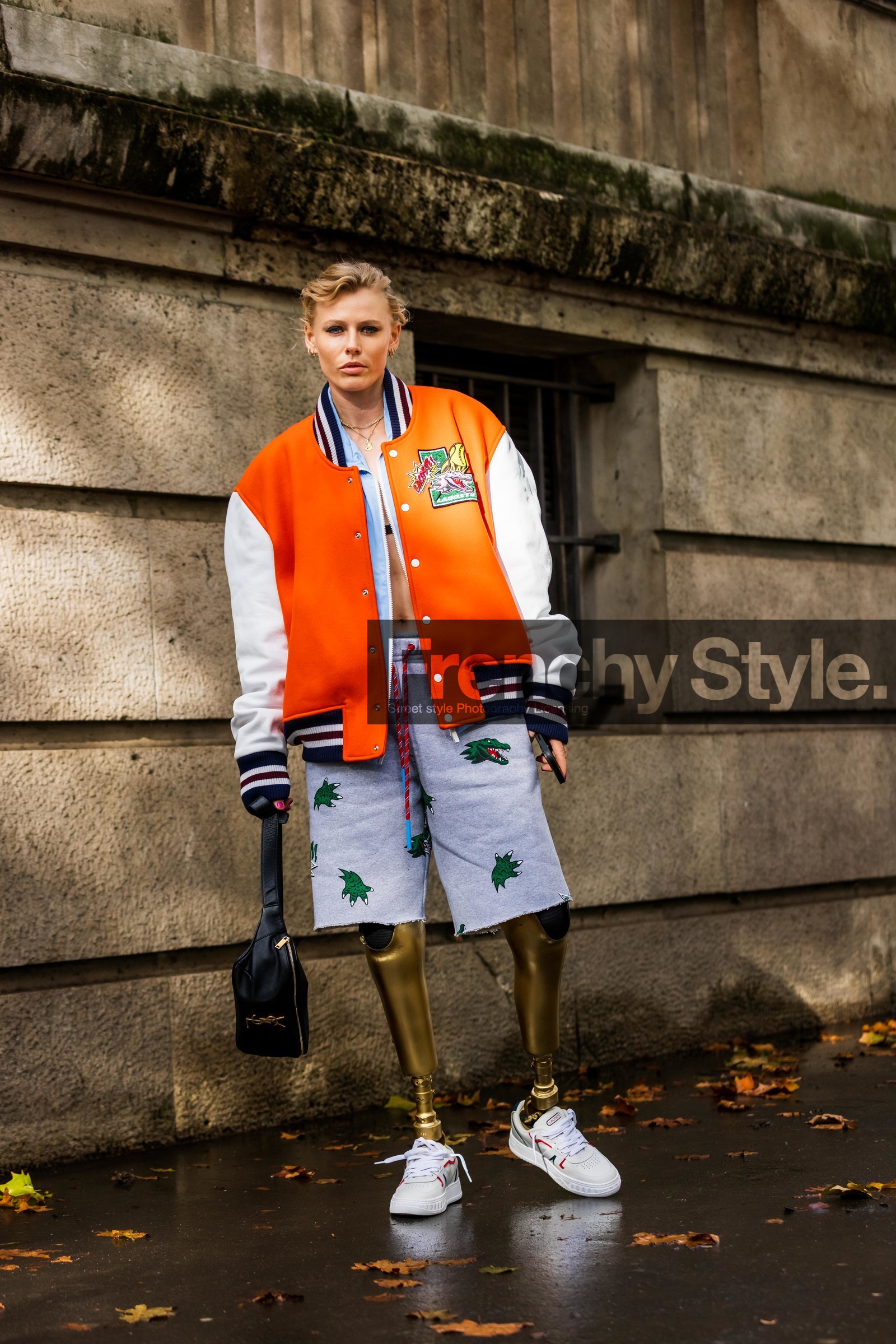 bag, beltbag, black bag, bomber, color, grey shorts, jogging, lacoste look, Lauren Wasser, orange bomber, shorts, sneakers, stripes, white sneakers, lacoste, fashion week, frenchystyle, FW, jonathan paciullo, street style, PFW, PARIS, SPRING SUMMER 2022, SS 22, vertical, full length