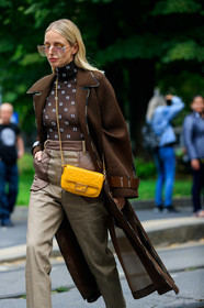 leonie hanne, fendi bag, fendi baguette bag, fendi jacket, fendi look, fendi pants, fendi top, fendi sunglasses, black top, turtleneck top, sheer top, monogrammed top, beige pants, yellow bag, yellow leather bag, monogrammed bag, chain strap bag, crossbody bag, big sunglasses, strassed sunglasses, brown coat, brown trench coat, openwork coat, street style, jonathan paciullo, FW, frenchystyle, fashion week, MFW, MILAN, SPRING SUMMER 2020, SS 20
