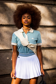 check, checked polo, green polo, Kayliah Balou, lacoste look, mini skirt, pleated skirt, polo, print, printed polo, skirt, tennis look, white skirt, lacoste, fashion week, frenchystyle, FW, jonathan paciullo, street style, PFW, PARIS, SPRING SUMMER 2022, SS 22, vertical, atmosphere details