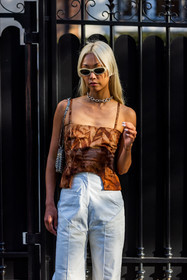 bag, brown top, chain necklace, choker, flare pants, leather pants, paco rabanne bag, pants, printed top, silver bag, silver choker, sunglasses, top, Vanessa Hong, white pants, white sunglasses, street style, jonathan paciullo, FW, frenchystyle, fashion week, PFW, PARIS, SPRING SUMMER 2022, SS 22, vertical, atmosphere details