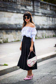 bag, black skirt, black sunglasses, choker, dior bag, embroidery, floral print, flower, long skirt, Maria Bernad, mules, off shoulder top, oversize sunglasses, pink bag, pink mules, pink sandals, pleated skirt, printed bag, sandals, silver choker, skirt, sunglasses, tattoo, white top, street style, jonathan paciullo, FW, frenchystyle, fashion week, PFW, PARIS, SPRING SUMMER 2022, SS 22, vertical, full length