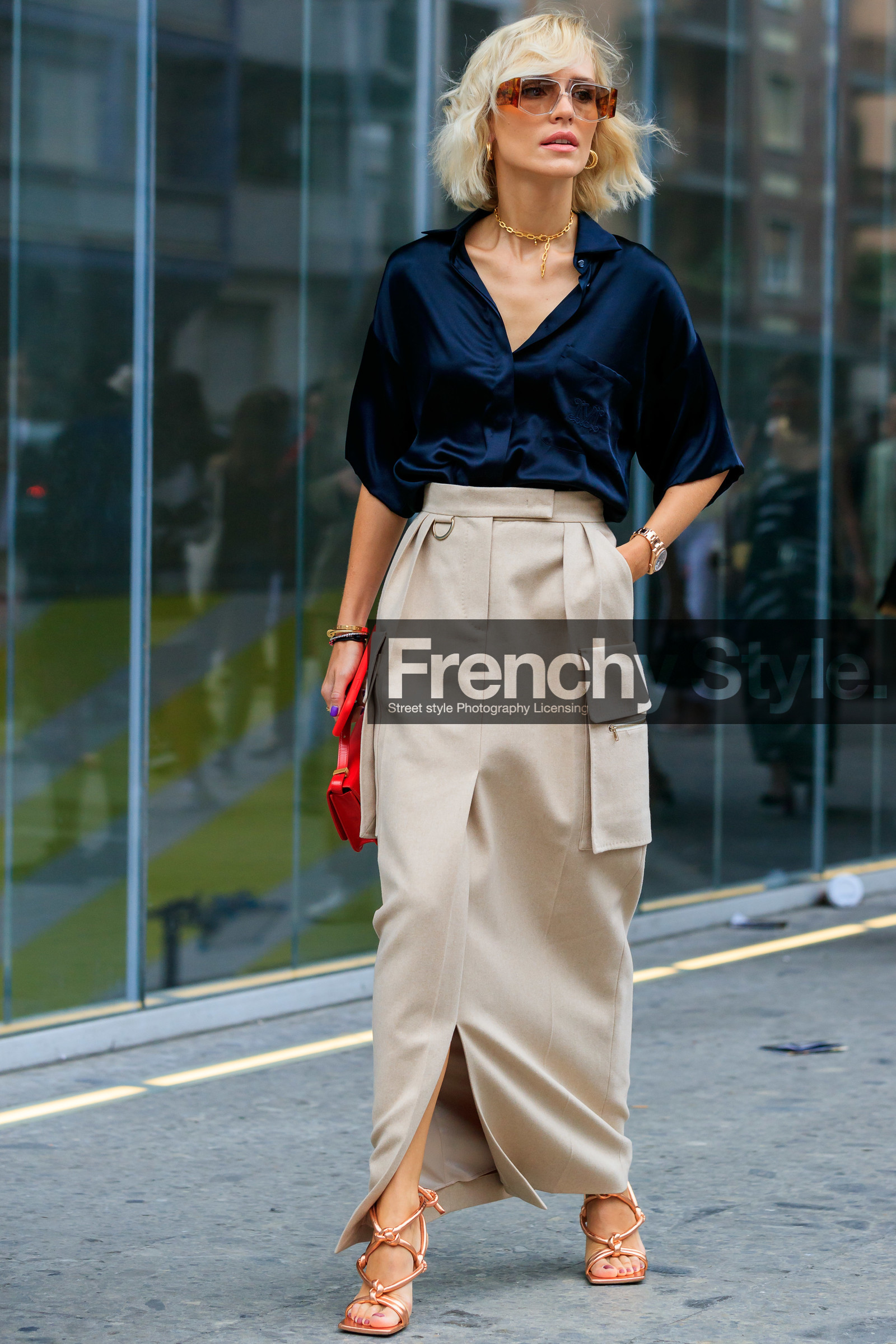 viktoria rader, max mara skirt, max mara look, max mara shirt, black shirt, silk shirt, short sleeves shirt, embroidered shirt, smoked sunglasses, hoop earrings, golden earrings, golden necklace, chain necklace, loose shirt, light beige skirt, long skirt, multi pocket skirt, red leather bag, hand bag, golden sandals, multi straps sandals, high heels sandals, knot details shoes, fashion week, frenchystyle, FW, jonathan paciullo, street style, MFW, MILAN, SPRING SUMMER 2020, SS 20