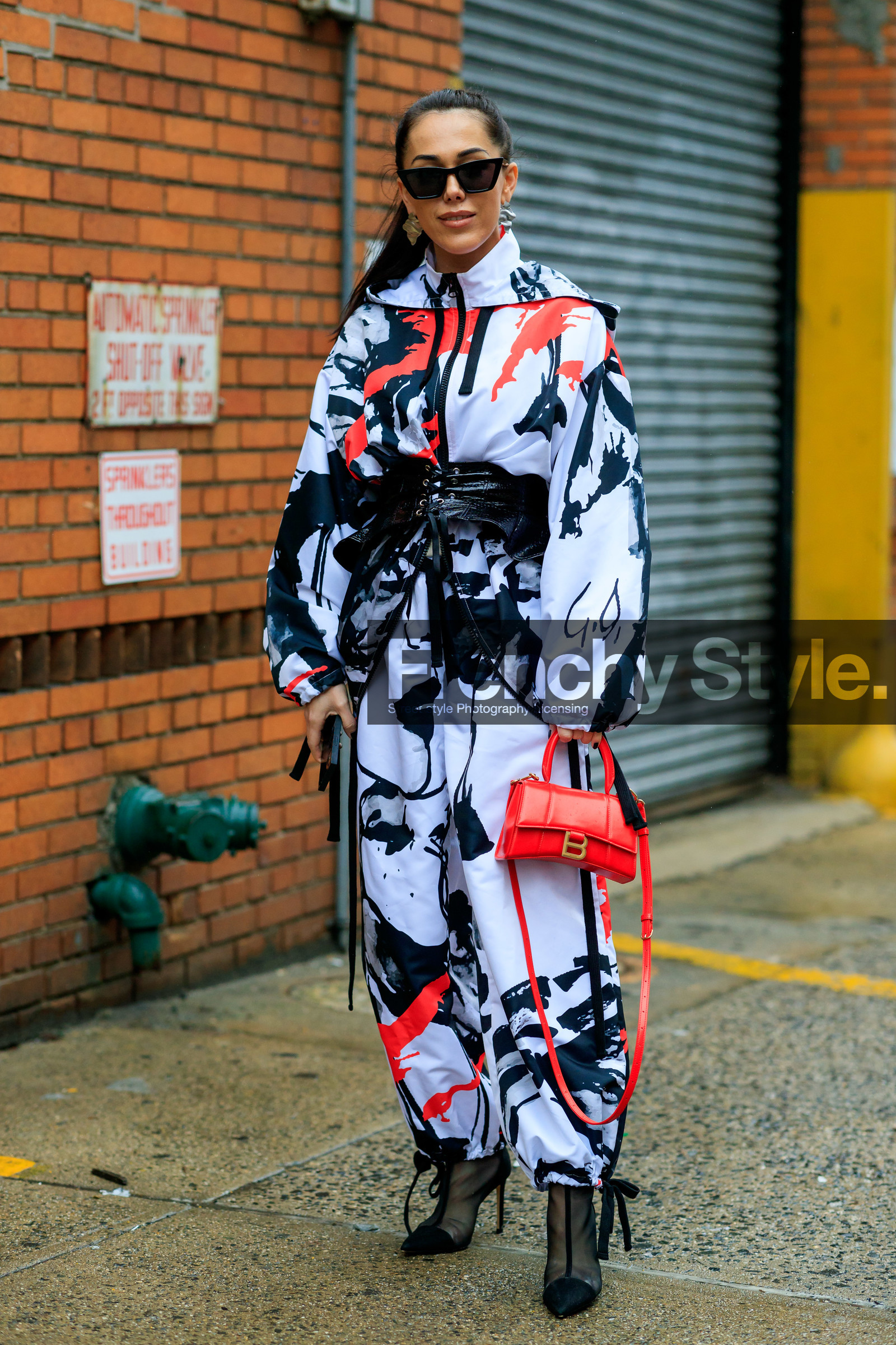 white pants, white jacket, white parka, jogging pants, sportswear, zipped jacket, printed jacket, printed pants, painted jacket, painted pants, red jacket, red pants, black pants, black jacket, black leather belt, laced belt, polish belt, corset belt, sharp end boots, sheer boots, high heels boots, red leather bag, balenciaga bag, belted jacket, silvered earrings, dangling earrings, fashion week, frenchystyle, FW, jonathan paciullo, street style, NYFW, NEW YORK, AUTUMN WINTER 2020-2021, FALL WINTER 2020-2021, FW 20-21, vertical, full length