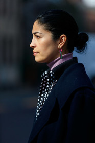 caroline issa, navy blue coat, black shirt, polka dots shirt, turtleneck pullover, lilac pullover, pink earrings, green earrings, dangling earrings, stone earrings, close up detail, nude make up, fashion week, frenchystyle, FW, jonathan paciullo, street style, MFW, MILAN, AUTUMN WINTER 2020-2021, FALL WINTER 2020-2021, FW 20-21, vertical, atmosphere details, detail