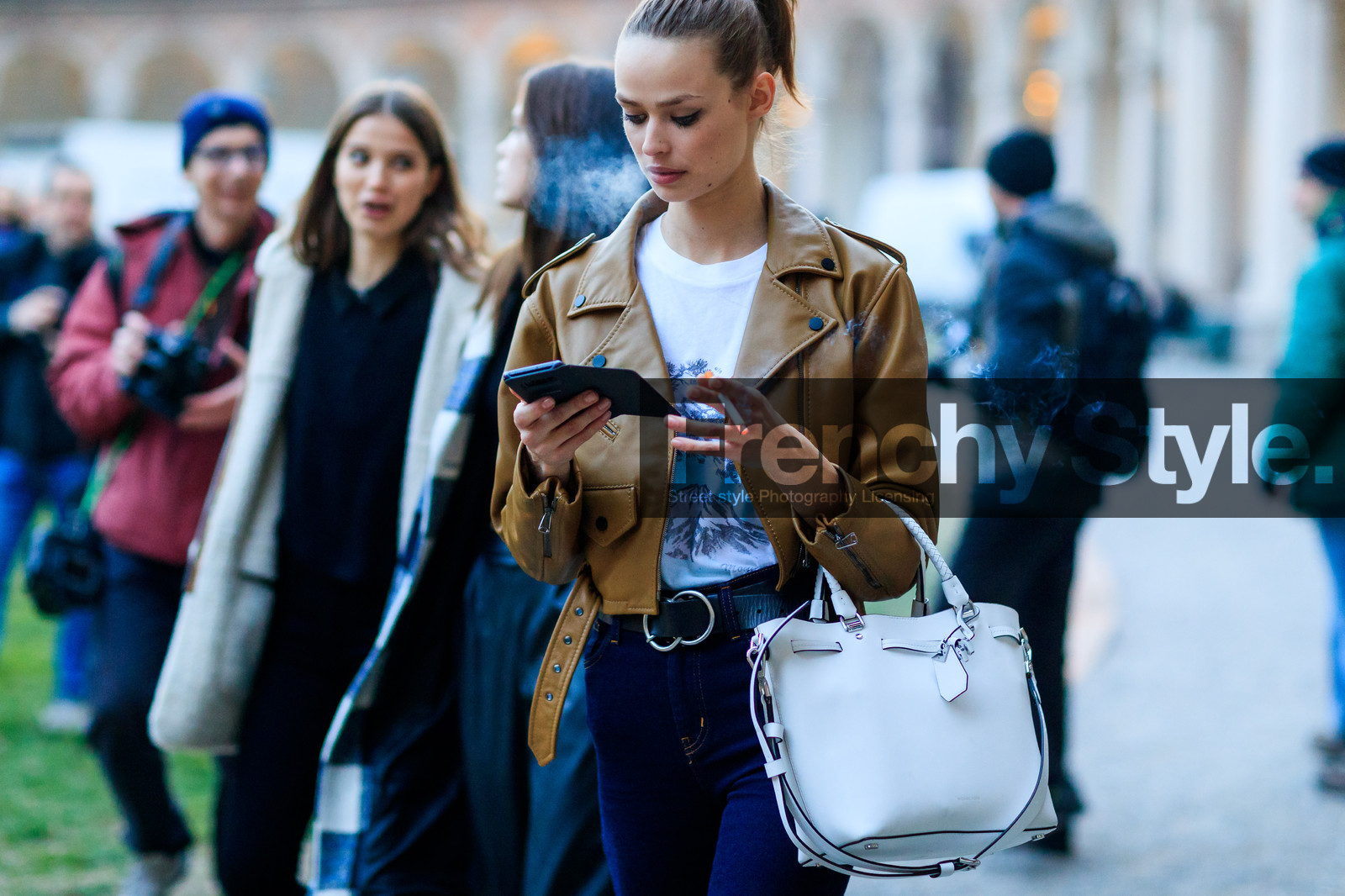 black belt, blue denim, camel jacket, denim pants, jeans, leather bag, leather belt, leather jacket, leather perfecto, printed t shirt, pulled back hair, trousers, white bag, white t shirt, fashion week, frenchystyle, FW, jonathan paciullo, street style, MFW, MILAN, AUTUMN WINTER 2018-2019, FALL WINTER 2018-2019, FW 18-19, horizontal, atmosphere details, model