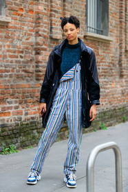 black coat, blue overall, blue sweater, graphic pants, leather jacket, leather shoes, louis vuitton, model, printed overall, printed pants, striped overall, trousers, white shoes, white sneakers, MILAN, MFW, fashion week, frenchystyle, FW, jonathan paciullo, street style, AUTUMN WINTER 2019-2020, AW 19-20, FALL WINTER 2019-2020, FW 19-20, vertical, full length