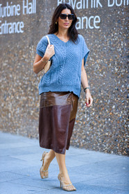 deborah reyner sebag, celine sunglasses, square glasses, black sunglasses, hoop earrings, golden earrings, oversize pull, knitwear, sleeveless pull, light blue pull, shoulder bag, mini bag, beige leather bag, piaget bracelet, golden bracelet, green pearls bracelet, brown leather skirt, mid long skirt, used pull, used skirt, bottega veneta shoes, white leather sandals, squared toed shoes, chain detail shoes, fashion week, frenchystyle, FW, jonathan paciullo, street style, vertical, full length