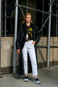 model, black leather jacket, black sweatshirt, long jacket, white jeans, cropped jeans, used jeans, letter printed sweatshirt, white sneakers, black sneackers, nike shoes, black hoodie, fashion week, frenchystyle, FW, jonathan paciullo, street style, NYFW, NEW YORK, AUTUMN WINTER 2020-2021, FALL WINTER 2020-2021, FW 20-21, vertical, full length